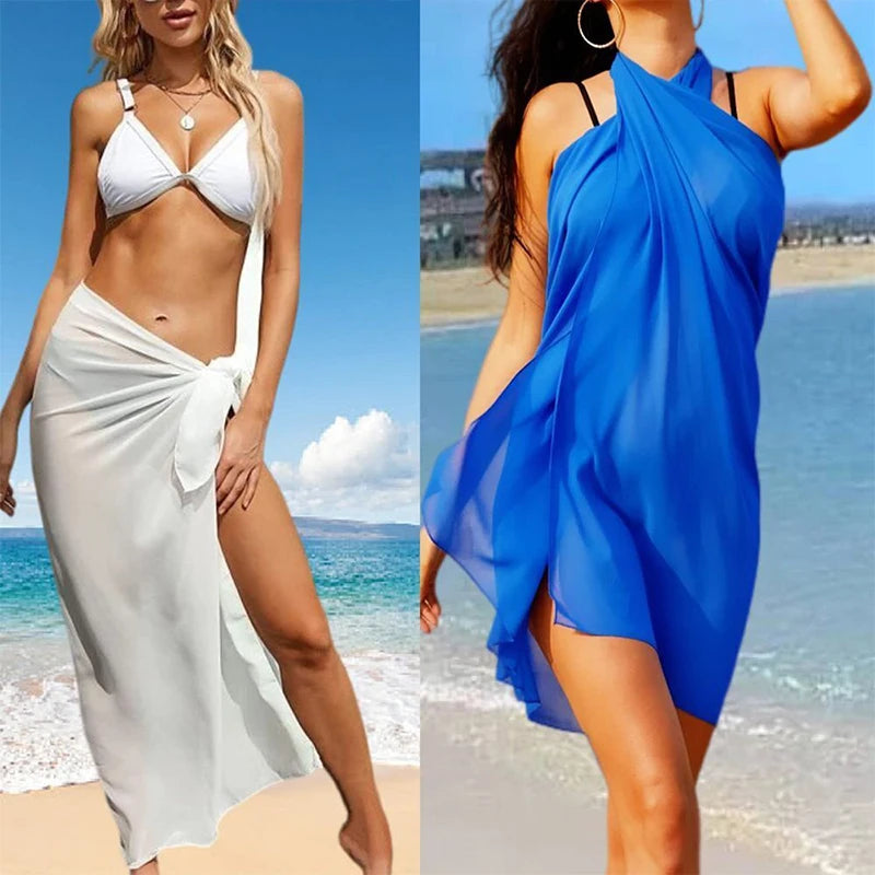 Model wearing Women's Chiffon Sunset Long Sarong Cover-Up on a tropical beach