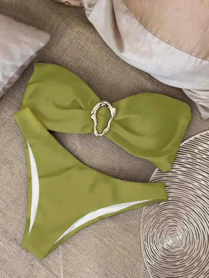 Bikini paired with sarong and accessories for styled summer outfit