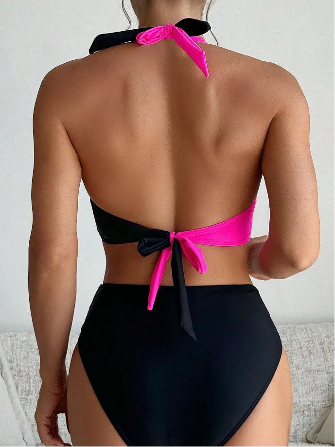 Flat lay of black Brazilian bikini set with strings untied