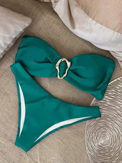 Bikini paired with sarong and accessories for styled summer outfit