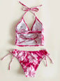 the rose red Cikini floral halter bikini with mid-rise bottoms 