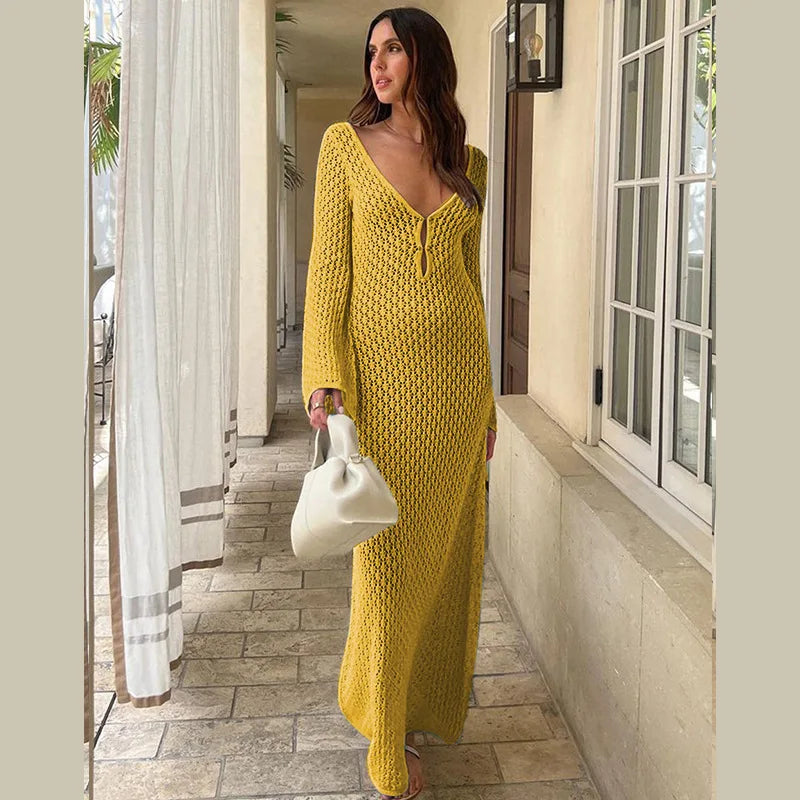 Lifestyle shot of Women's Lunar Lace Cover-Up at a tropical resort yellow color 