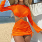 Model walking on the beach in Women's Brazilian Breeze Three-Piece Bikini Set orange 