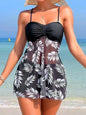 Model wearing Women's Coastal Charm Swimsuit Dress on a sunny beach black