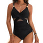 Model wearing sculpting black one-piece swimwear