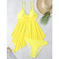  Model wearing Women's Active Tide Tankini Set on a tropical beach