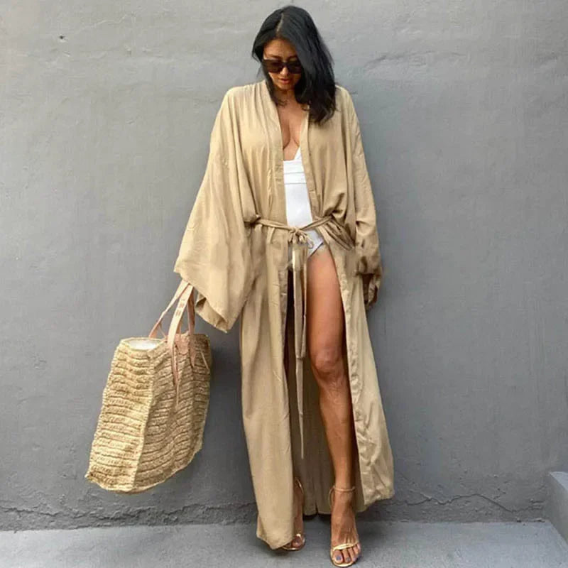 Model walking on the beach in Women's Belted Breeze Kimono Cover-Up