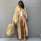 Model walking on the beach in Women's Belted Breeze Kimono Cover-Up
