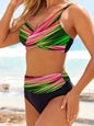 Flat lay of Sunset, Blue Lagoon, and Rainbow Stripe bikinis