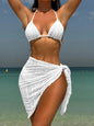 Front view of 3-piece halter bikini set with high-leg bottoms and sarong white style 