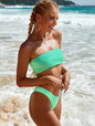 Side angle showing sculpting fit of high-waist bottom