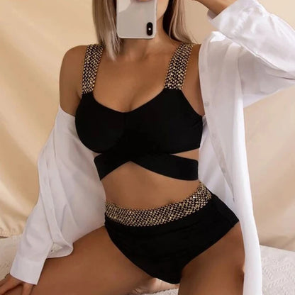 Model posing in gold patchwork high-waist bikini