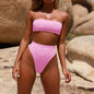 Strapless design showing tan-line-free shoulders