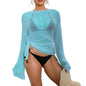 front view of the model wearing  blue Beach Cover-Up at tropical beach  