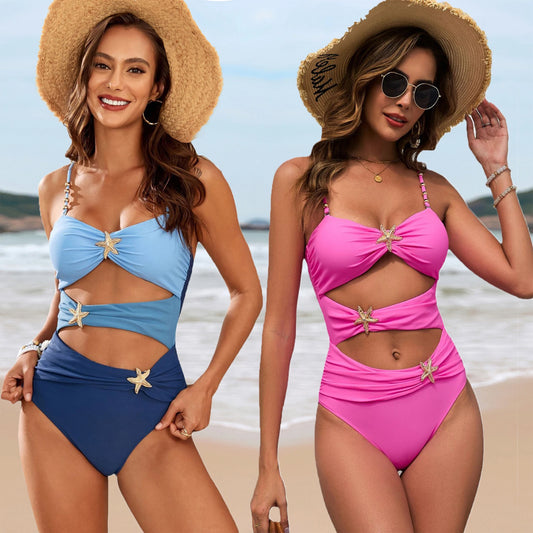 Close-up of metal buckle detail on fashionable one-piece swimsuit