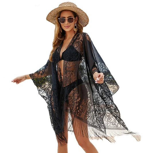 Model wearing Women's Floral Lace Kimono Cover-Up on a tropical beach