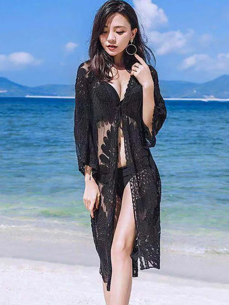 Model wearing Women's Floral Lace Kimono Cover-Up on a tropical beach