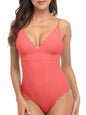 Model wearing high-stretch one-piece swimsuit in blush pink