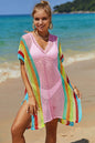 Model wearing knit cover up over bikini at the beach 