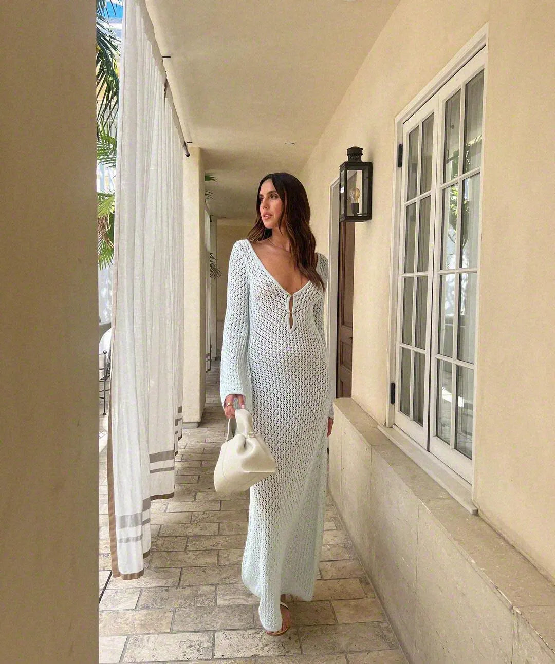 Women's Lunar Lace Cover-Up styled with accessories at a resort