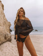 Model walking on the beach in Women's Mesh Glow Knitted Sweater Cover-Up