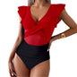 Close-up of ruffle sleeve and ruched detail on swimsuit