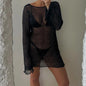 Front view of Women's Sheer Glow Long-Sleeve Beach Mini Dress Cover-Up in black