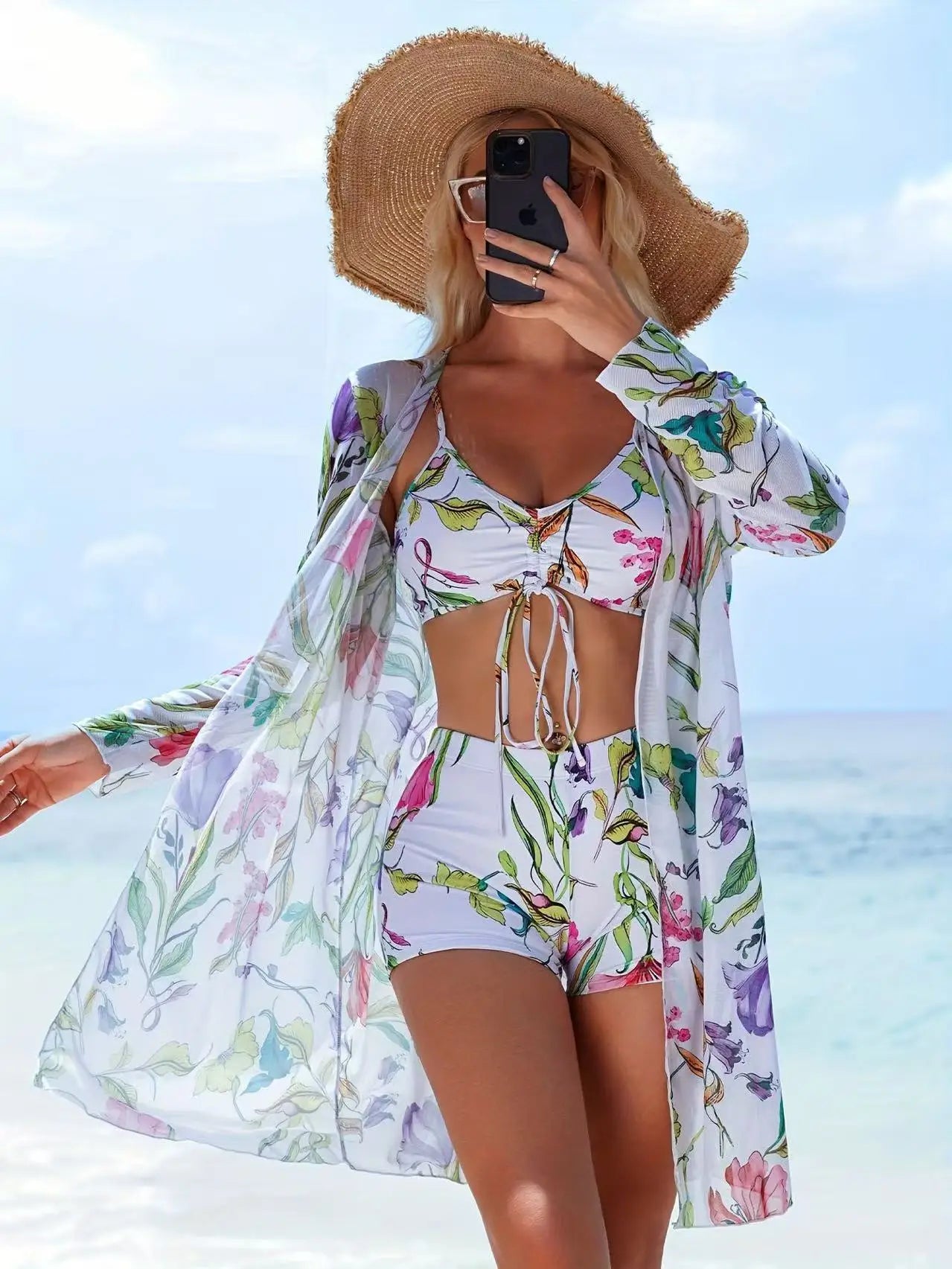 Model walking on the beach in Women's Siren Splash Three-Piece Tankini Set