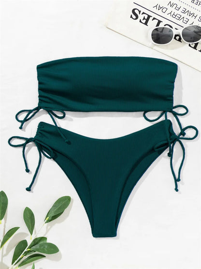Front view of solid push-up Brazilian bikini with cheeky cut bottoms black 