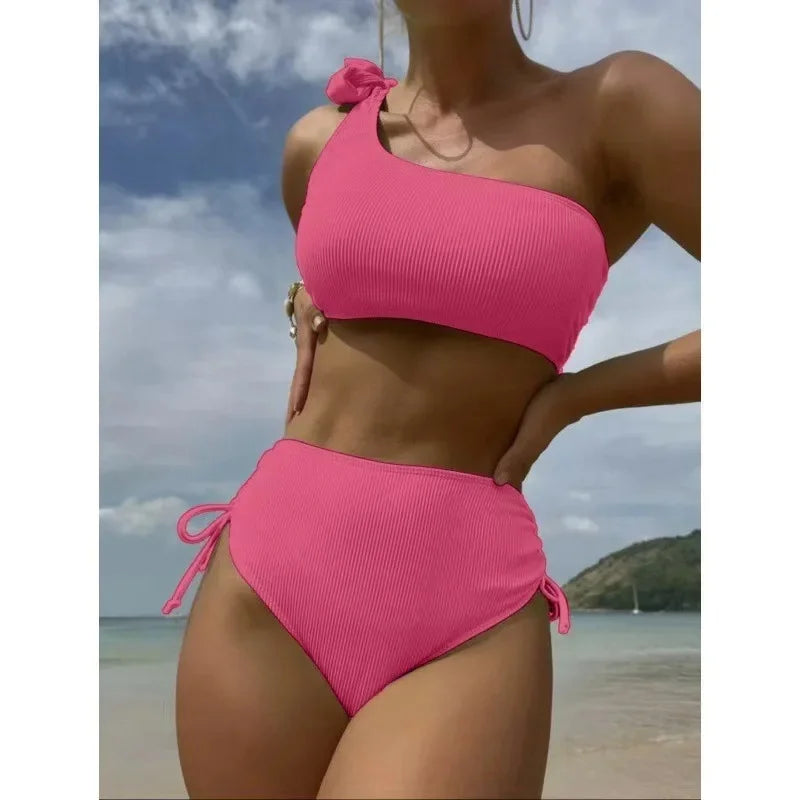 Front view of strapless bikini with knot tie top and side-tie bottoms  blue style  Pink style 