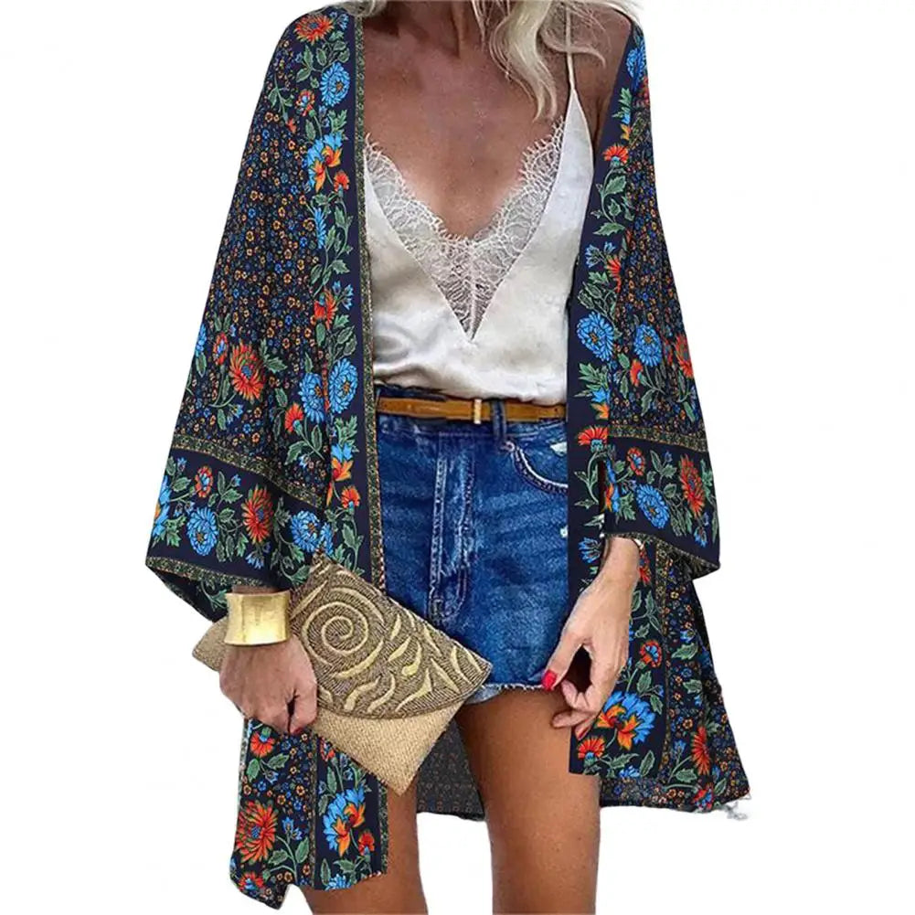 Model wearing Women's Sunlit Sheer Long Cardigan Cover-Up on a tropical beach