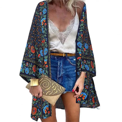 Model wearing Women's Sunlit Sheer Long Cardigan Cover-Up on a tropical beach