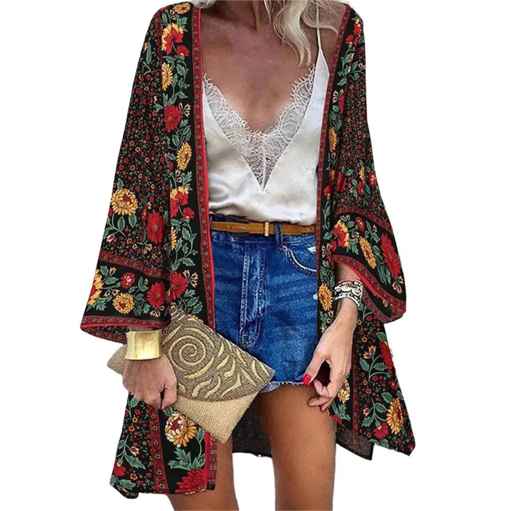 Women's Sunlit Sheer Cardigan Cover-Up worn during a sunset beach shoot